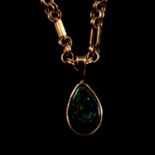 A simulated opal pendant and chain.