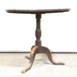 George III oak tripod table,
