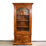 Cherry wood gun cabinet, adapted as a display cabinet, glass fronted