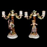 A pair of early 19th century Derby two light candelabra.