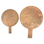 Large Japanese bonze hand mirror and another,
