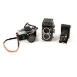 Eleven vintage cameras, including Rolleiflex twin-lens camera