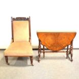 Victorian burr walnut Sutherland table and a mahogany framed nursing chair,