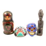 Two African carved wood figures and other artefacts,