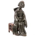 Japanese bronze figure of a young woman seated on a hardwood stool