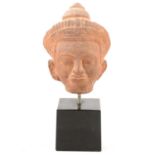 Asian carved stone head,