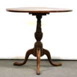 George III oak tripod table,