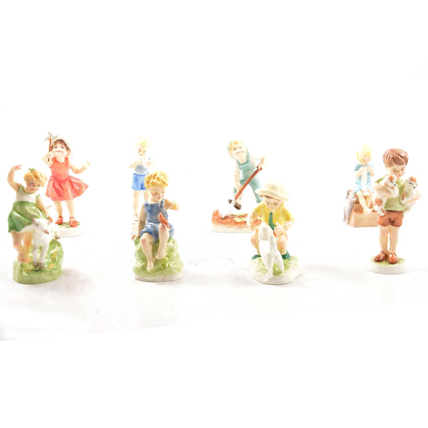 Eight Royal Worcester figurines by Freda Doughty