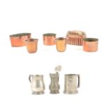 Two copper Jones Brothers moulds, other copper moulds, and pewter tankards
