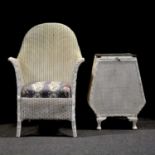 Lloyd Loom white painted bedroom chair and a mesh linen bin.