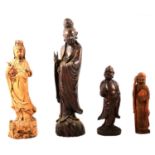 Chinese carved wood figure, Guanyin, another and two other carvings,