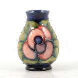 Moorcroft Pottery, a 'Rose' design vase by Sally Tuffin, 1990