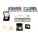 Collection of commemorative coins and stamps,