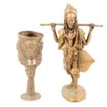 African metal goblet and a brass figure,