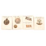 Approx. seventy military cap badges, lapel badges and buttons.