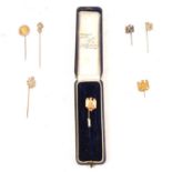 Seven tie pins of Napoleon interest.