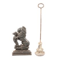 Lead door-stop; and a cast iron flat-back lion rampant.