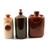 Collection stone hot water bottles, flasks and related stoneware.