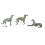 Three cast patinated bronze greyhound models