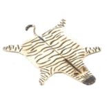 Bergmann style painted bronze model, zebra rug,