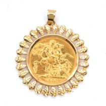 A Gold Full Sovereign Coin pendant.