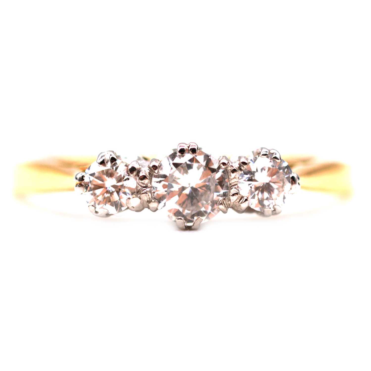 A diamond three stone ring.