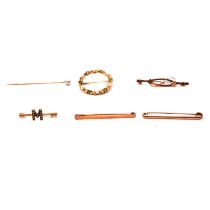 Four bar brooches, garland brooch and stick pin.