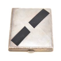 A silver coloured cigarette case.