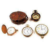 A railway timekeeper's pocket watch, other pocket watches and a marching compass.