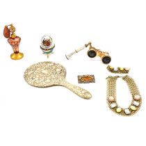 A collection of rolled gold, white metal and costume jewellery and vintage dressing table items.