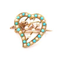 A turquoise and pearl heart brooch.