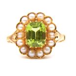 A peridot and pearl cluster ring.