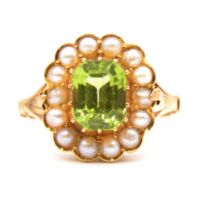 A peridot and pearl cluster ring.