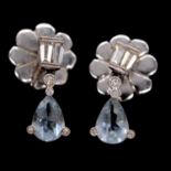 A pair of aqua coloured and diamond earrings.