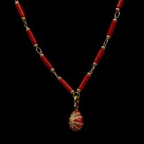 A Faberge style pendant and necklace.
