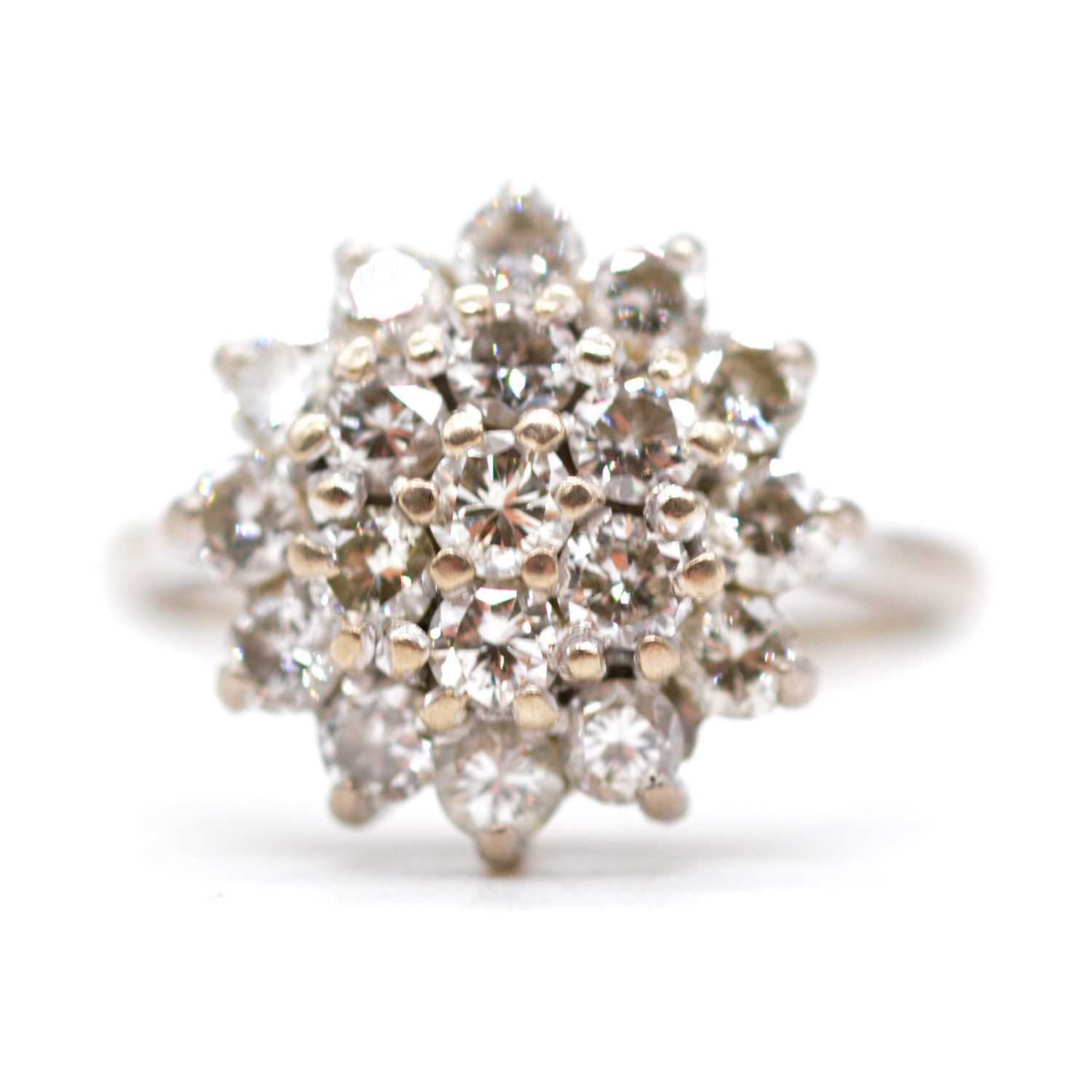 A diamond cluster ring.