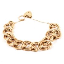 A 9 carat yellow gold hollow link bracelet.