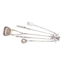 A Victorian silver chatelaine with attachments.