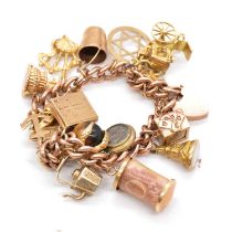 A gold charm bracelet with charms.