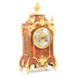 Louis XIV style gilt metal and red tortoiseshell mantel clock,