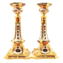 Pair of Royal Crown Derby bone china silver shaped candlesticks,