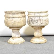 Pair of veined marble pedestal urns,