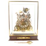 Sinclair Harding, Cheltenham, a contemporary brass skeleton clock,