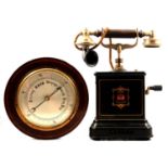 Vintage Jydsk telephone and an aneroid barometer,
