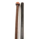 Metal-clad walking cane and an ebonised stick