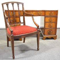 Reproduction mahogany desk, and an elbow chair,