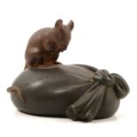 Japanese bronze okimono of a rat on a food bag