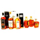 Six bottles of assorted whisky