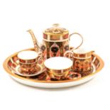 Royal Crown Derby, a miniature Imari pattern tea service on tray