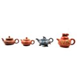 Collection of modern Chinese redware teapots and cast metal sculptures